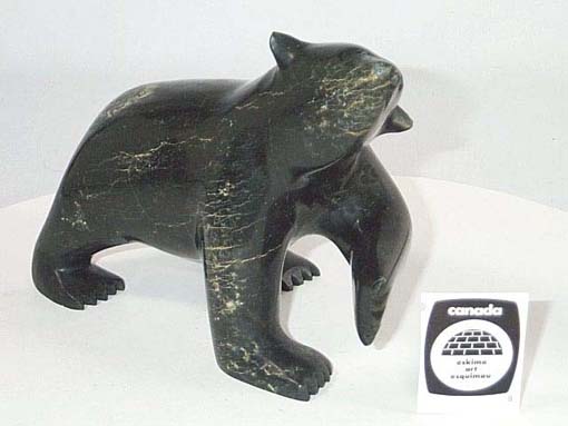 Ours marchant